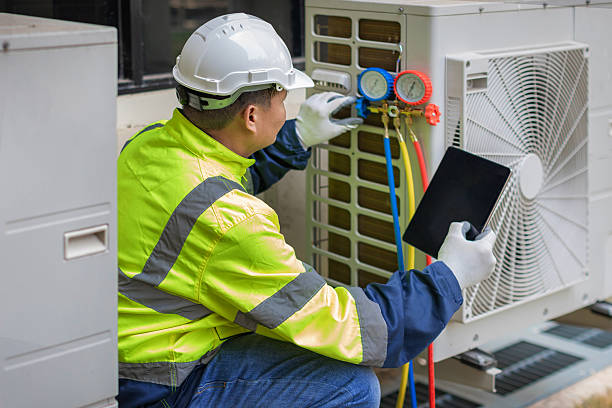 Professional Heat Pump Repair technician working in Grantsburg, WI